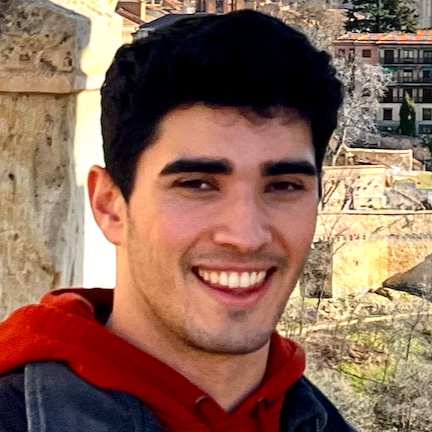 ricky juan ramos is a young hispanic person with short black hair and a wide smile